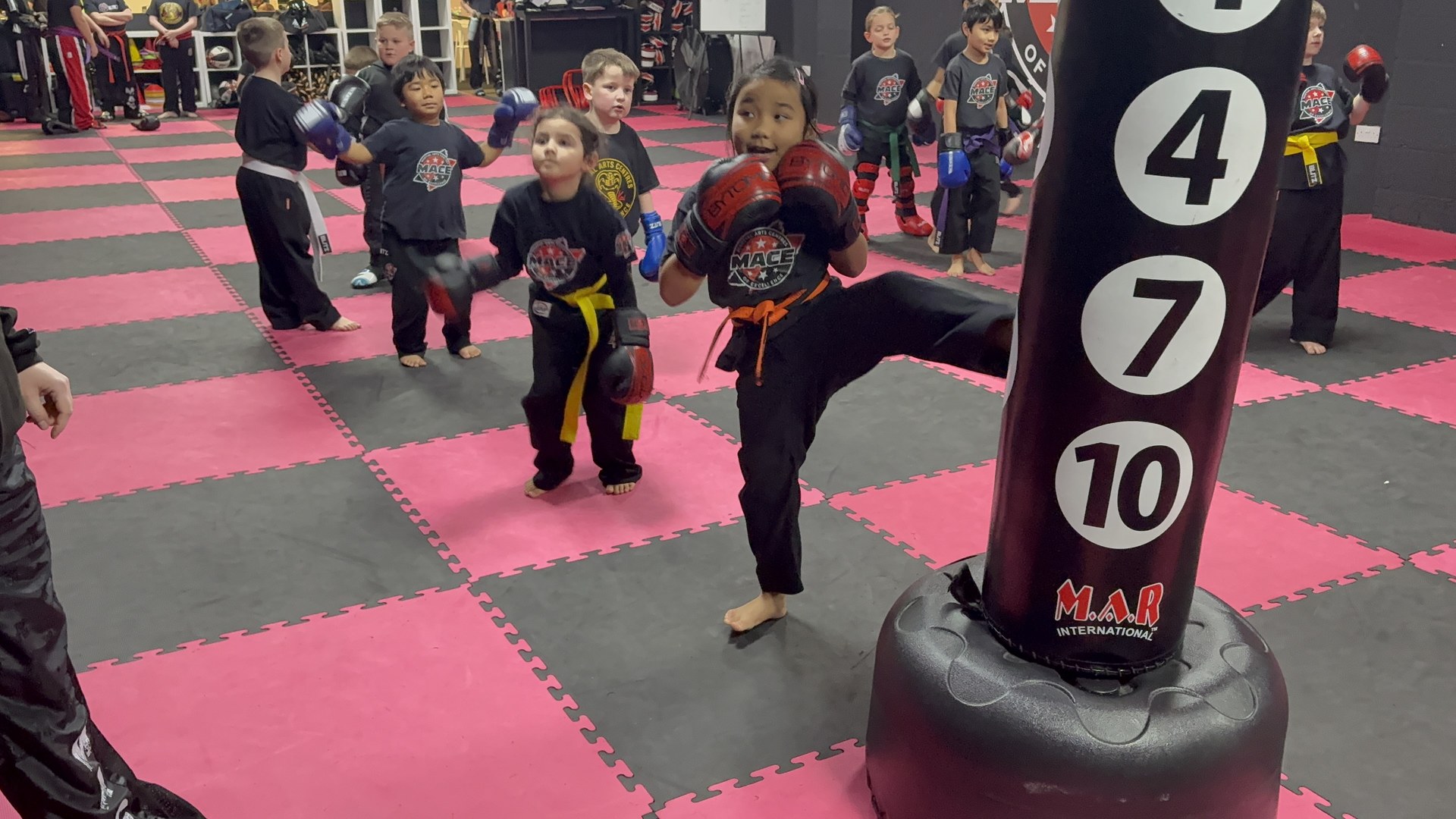 Dragons students training on the mats at MACE
